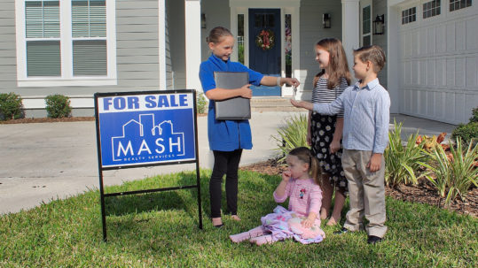 Kids selling real estate.